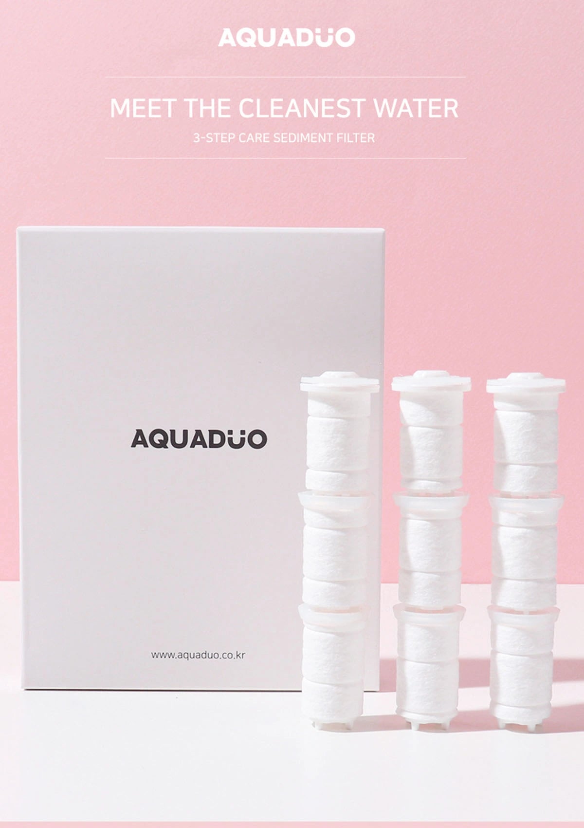Aquaduo water filter packaging with three white filters on a pink background